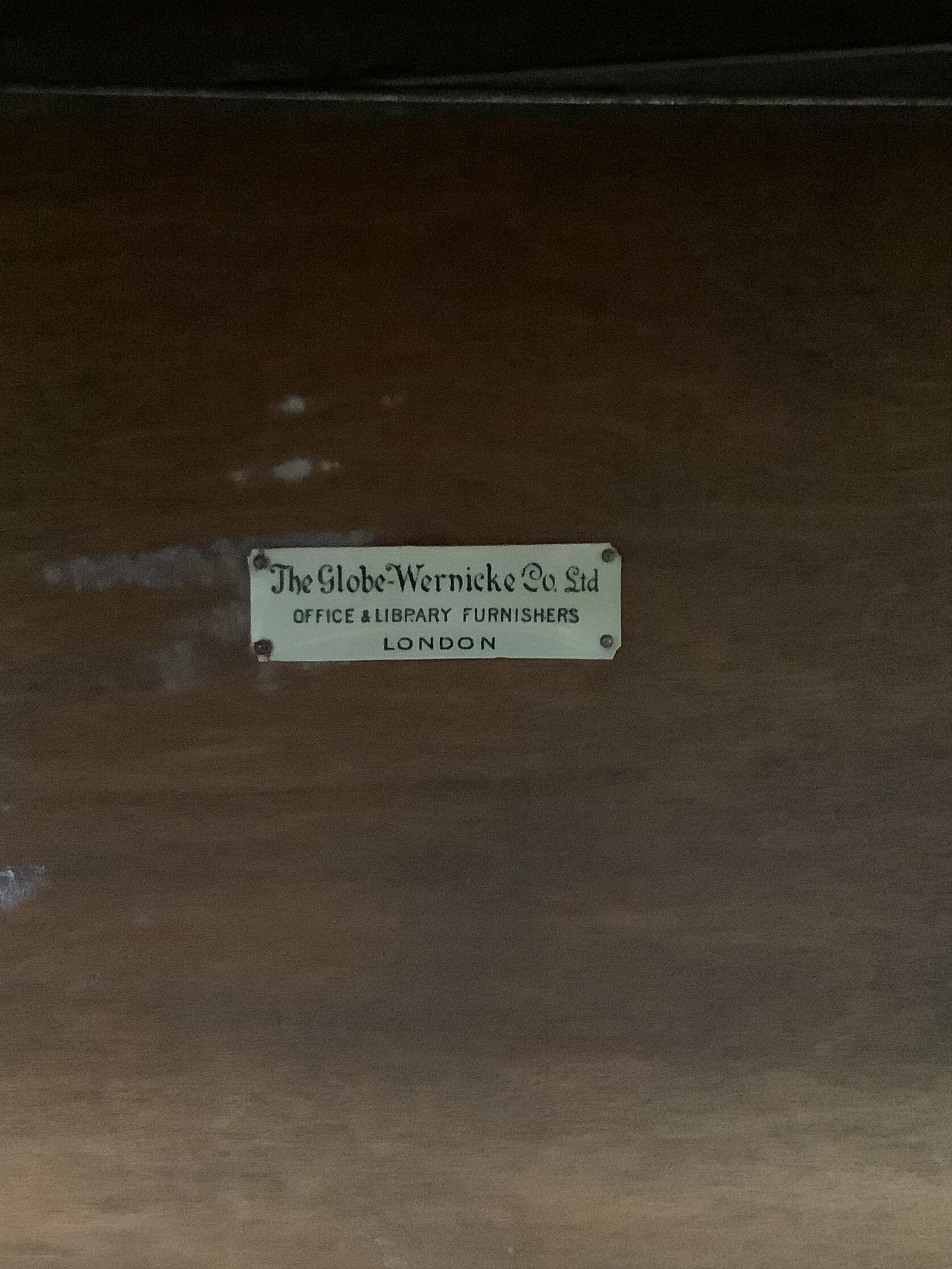 A Globe Wernicke mahogany four section bookcase, width 86cm, depth 31cm, height 165cm. Condition - fair